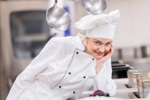 Chef Cooking, Cutting and preparing next plate Stock Photos