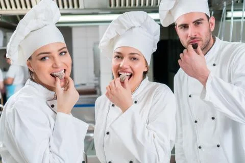 Chef Cooking, Cutting and preparing next plate Stock Photos