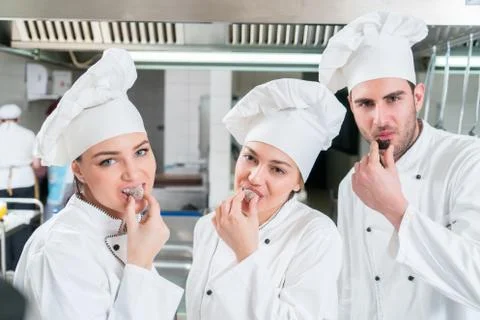 Chef Cooking, Cutting and preparing next plate Stock Photos