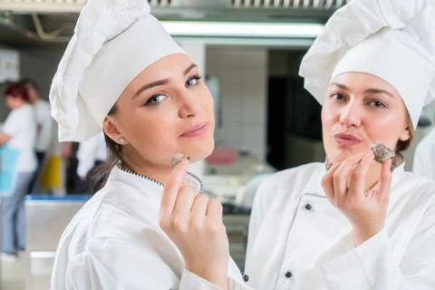 Chef Cooking, Cutting and preparing next plate Stock Photos