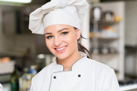 Chef Cooking, Cutting and preparing next plate Stock Photos