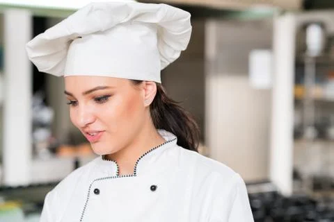 Chef Cooking, Cutting and preparing next plate Stock Photos