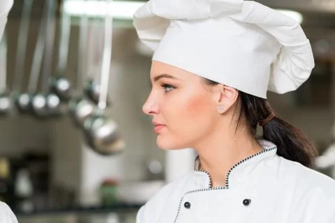 Chef Cooking, Cutting and preparing next plate Stock Photos