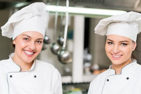 Chef Cooking, Cutting and preparing next plate Stock Photos