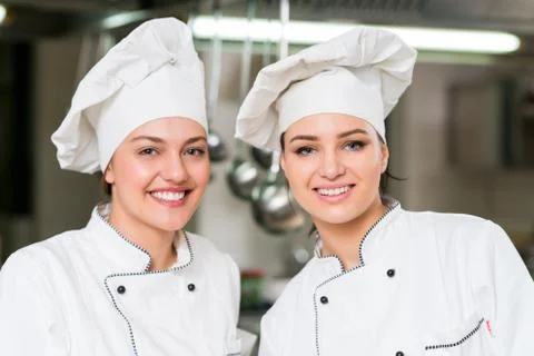 Chef Cooking, Cutting and preparing next plate Stock Photos