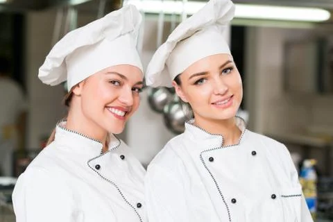 Chef Cooking, Cutting and preparing next plate Stock Photos