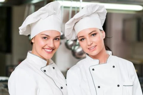Chef Cooking, Cutting and preparing next plate Stock Photos