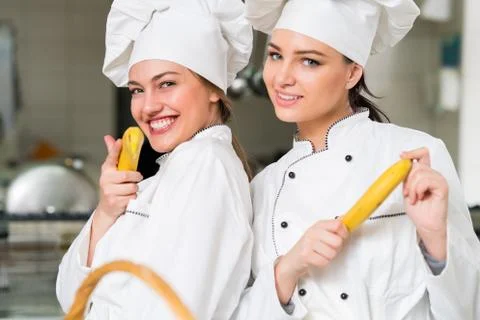 Chef Cooking, Cutting and preparing next plate Stock Photos