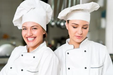 Chef Cooking, Cutting and preparing next plate Stock Photos