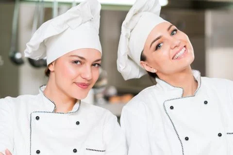 Chef Cooking, Cutting and preparing next plate Stock Photos