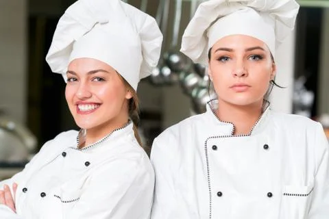 Chef Cooking, Cutting and preparing next plate Stock Photos
