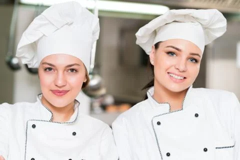 Chef Cooking, Cutting and preparing next plate Stock Photos