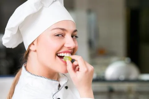 Chef Cooking, Cutting and preparing next plate Stock Photos