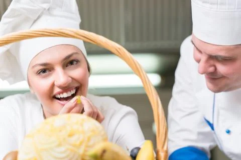 Chef Cooking, Cutting and preparing next plate Stock Photos