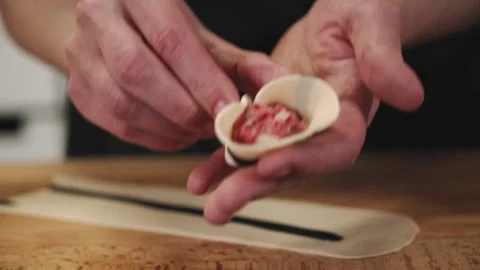 Chef cooking dumplings with meat. Stock Footage 147005043
