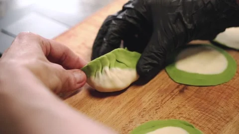 Chef cooking dumplings with meat. Stock Footage 147306714