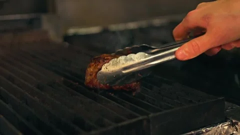 Chef Cooking Filet Mignon Steak On a Kitchen Grill Over Open Fire Stock Footage 280494808