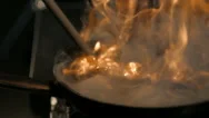 Chef Cooking With Fire In Frying Pan.
Professional Chef In A Commercial Kitchen Stock Footage