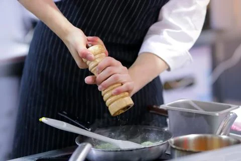 Chef cooking food in the kitchen, Chef preparing food Stock Photos