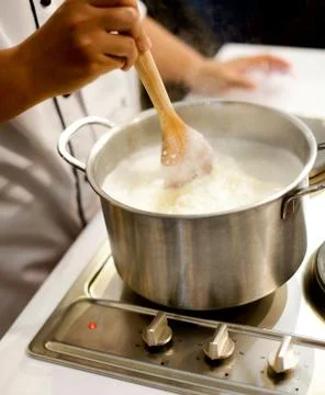 Chef cooking food in the kitchen, Chef preparing food Stock Photos