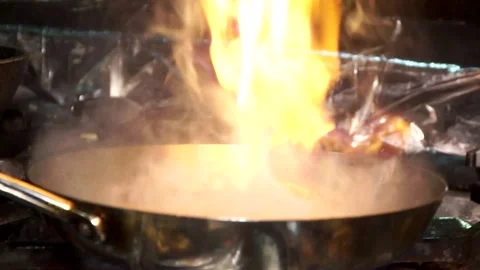 Chef is cooking Stock Footage 130947875