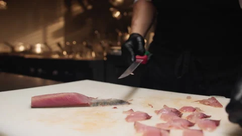Chef Cooking Fresh Fish Into a Kitchen Of a Cruise Ship Stock Footage 254944173