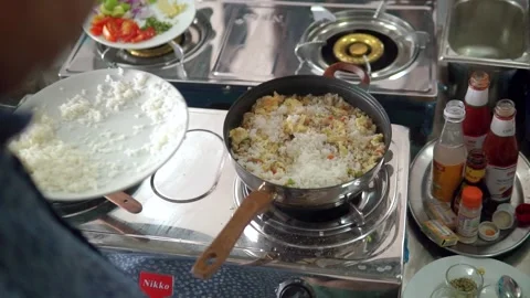 Chef cooking fried rice Video stock 146777376