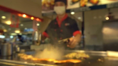 Chef Cooking Frying Food. Defocused shot Video stock 75762169