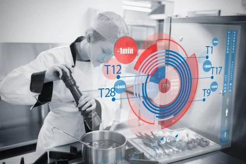 Chef cooking with futuristic interface Stock Photos