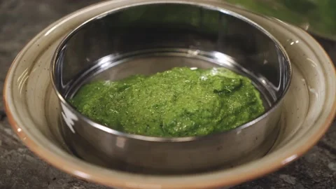 Chef cooking green sauce. Stock Footage 147110629