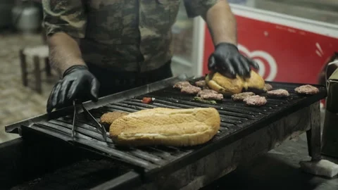 Chef cooking Half bread meat meatball sandwich on the hands on a man, Turkish Stock Footage 238552642
