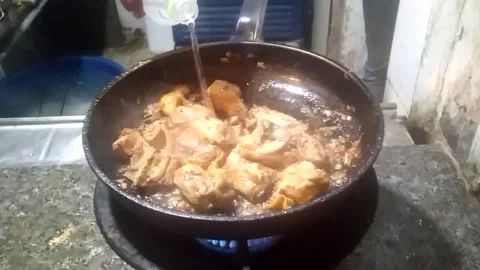 Chef Cooking A Indian Dish Fried Chicken at Restaurant Stock Footage 162659706