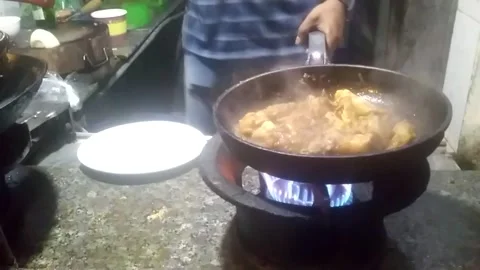 Chef Cooking A Indian Dish Fried Chicken in Frying Pan at Restaurant Stock Footage 162659756