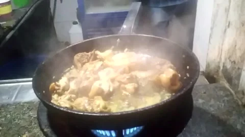 Chef Cooking A Indian Dish Fried Chicken in Frying Pan at Restaurant Stock Footage 162659778