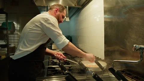 Chef Cooking In The Kitchen Pan Of A Cruise Ship Stock Footage 276236933