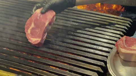 Chef cooking Meat at Argentinian Grill Parrilla Restaurant 4k Stock Footage 218263174