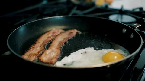 A Chef cooking meat with frying pan in kitchen. 스톡 동영상 334643093