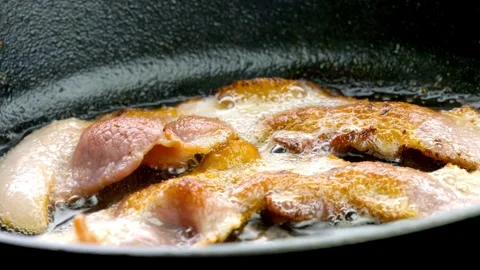 A Chef cooking meat with frying pan in kitchen. 스톡 동영상 334643146