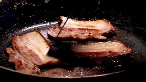 A Chef cooking meat with frying pan in kitchen. 스톡 동영상 334643226