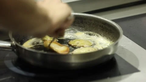 The chef is cooking mushrooms 13 Stock Footage 314977894