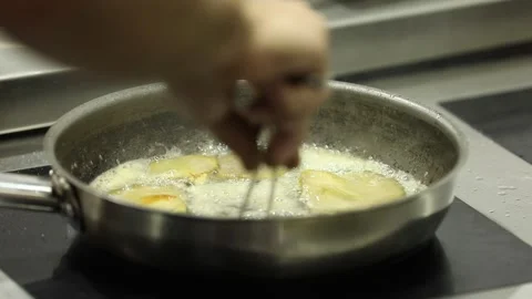 The chef is cooking mushrooms 9 Stock Footage 314977854