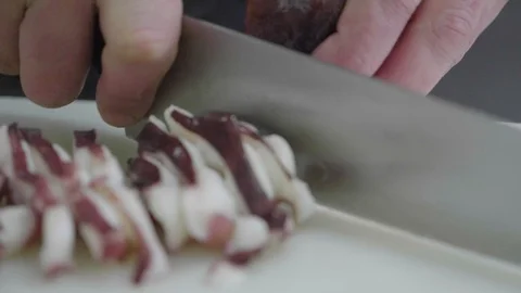 Chef cooking octopus Stock Footage 104103463