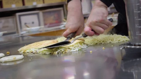 Chef cooking Okonomiyaki Stock Footage 101999367