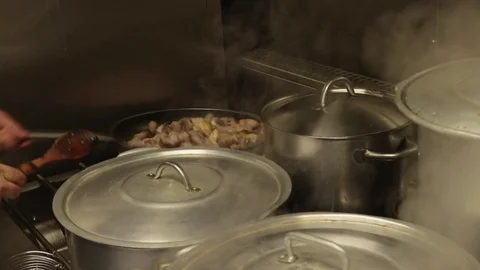 Chef cooking in a pan  Stock Footage 72976476