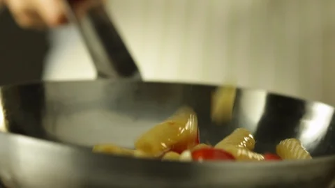 Chef Cooking Pasta on a Pan Stock Footage 86137911