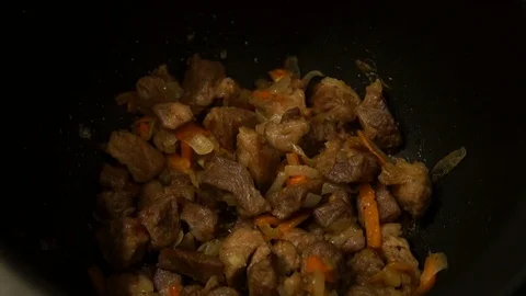 Chef cooking pilaf. Cooking process. National food. Rice and meat. Pilau Stock Footage 100104655