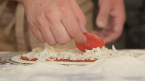 Chef cooking pizza in restaurant Stock Footage 116895450