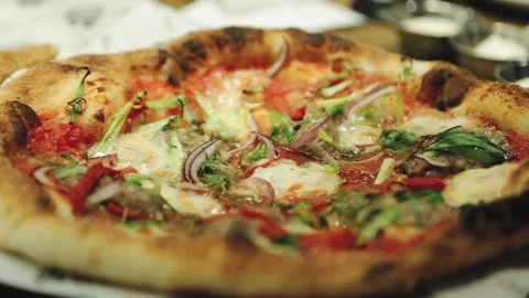Chef is cooking pizza in the restaurant. Stock Footage 134266251