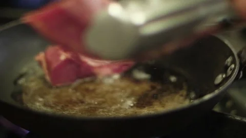 Chef cooking rack of lamb in the frying pan Video stock 78142701