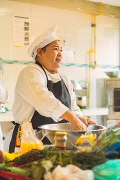 Chef cooking in restaurant kitchen Stock Photos